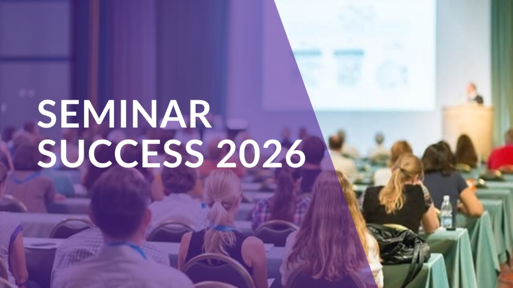 Small group seminar in a hotel meeting room with interactive screen