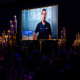 big screen at the Blueprint Homes 20th Anniversary Dinner Perth