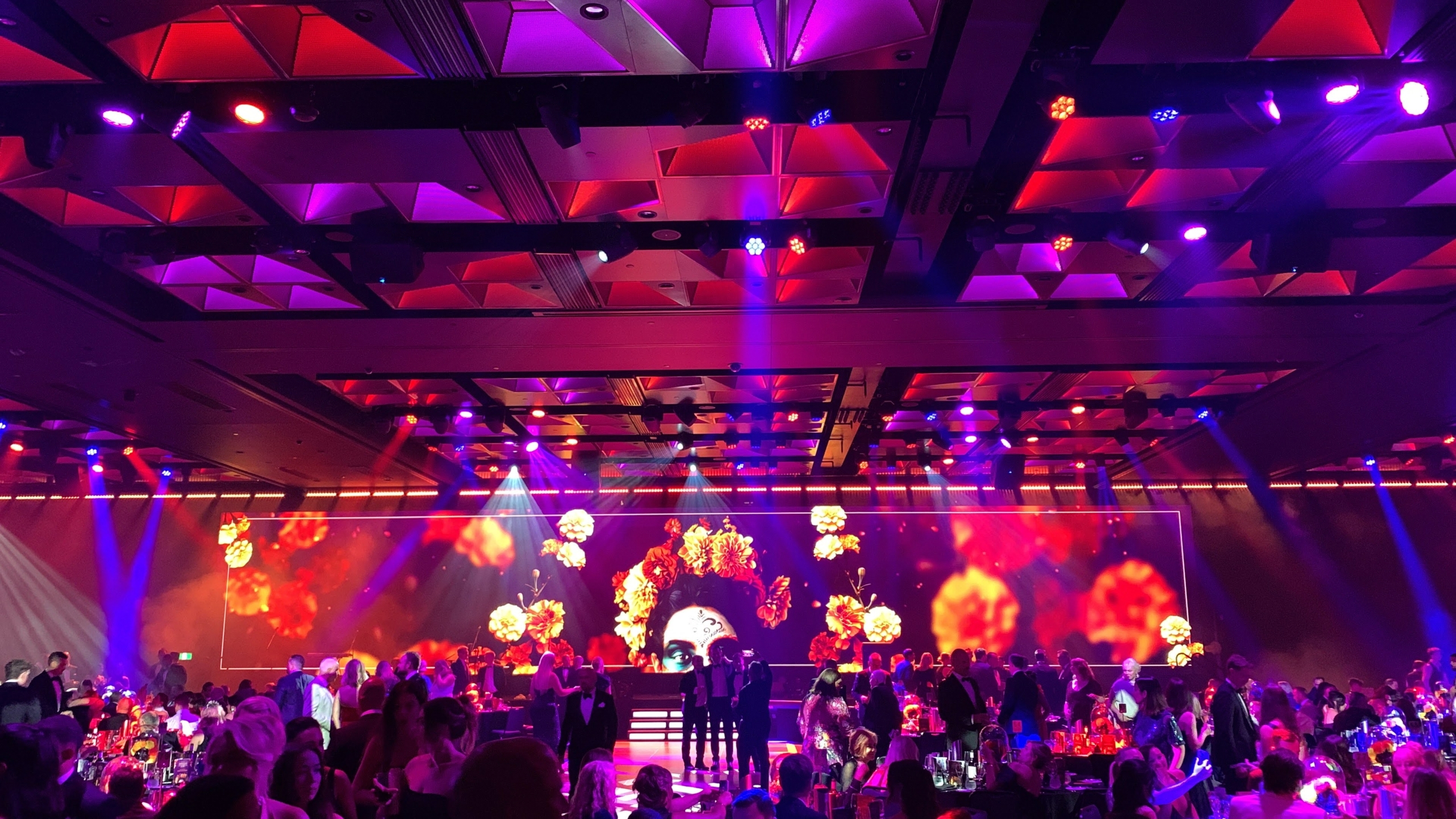 crowd enjoying a themed christmas party