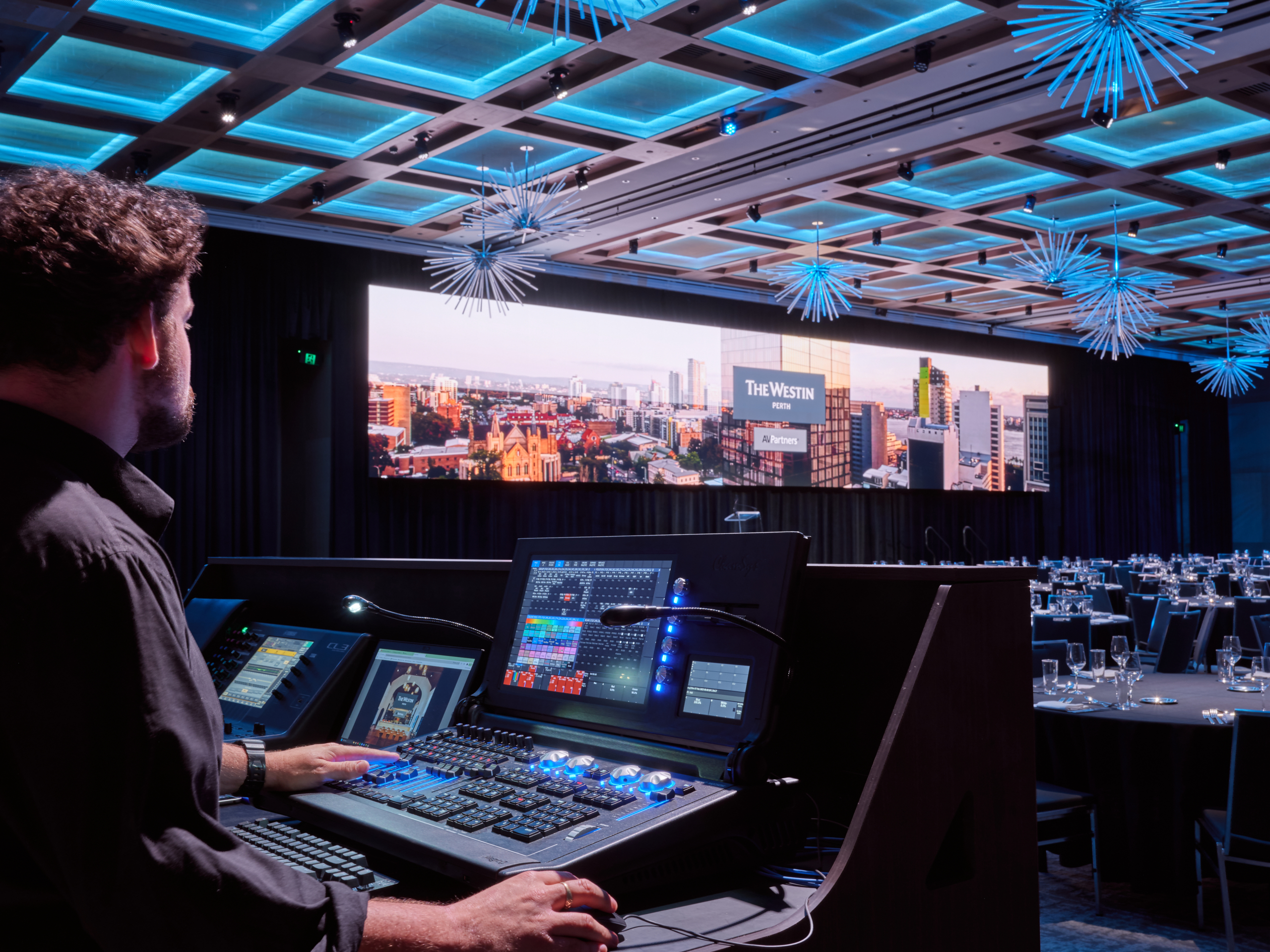 AVPartners team member runs av test pre-show