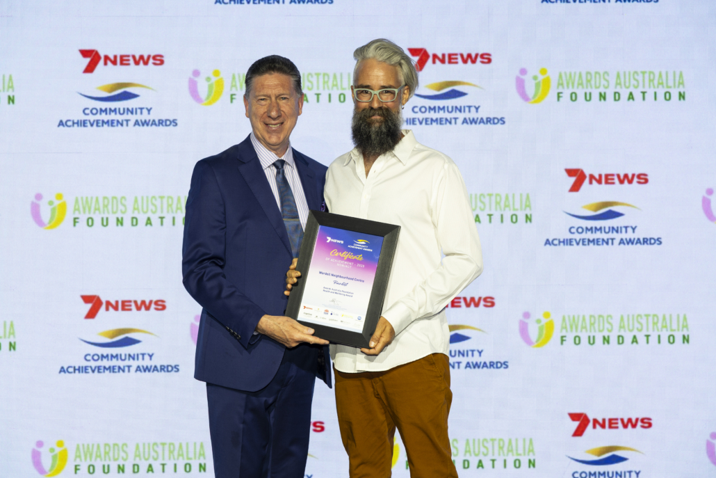 Joel Orchard, Wardell Neighbourhood poses for photo at Community Achievement Awards