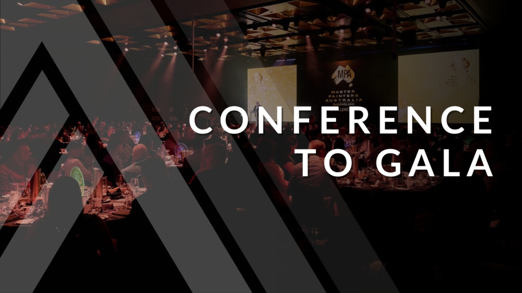 Presenter on stage at during a gala dinner hosted in large ballroom