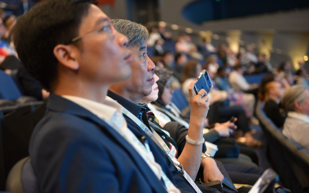 conference attendees watch lecture 